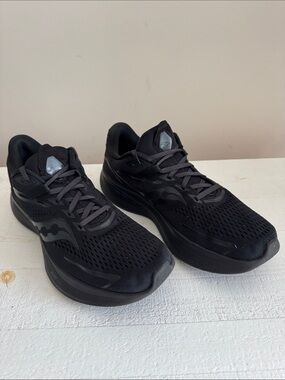 Women’s Saucony Ride 15 All-Black Running Sneakers.
